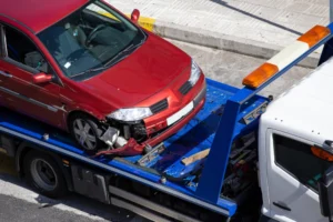 crashed-car-loaded-on-a-tow-truck-2025-02-22-09-31-50-utc